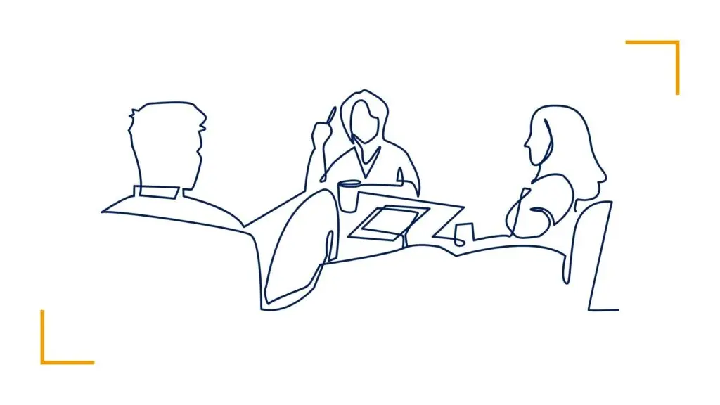 Three people having a meeting discussion.